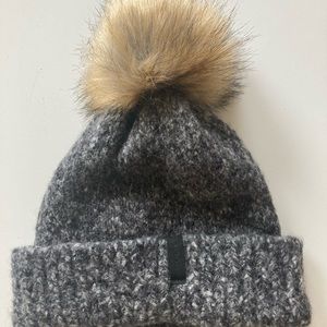 Lined hats with pompom